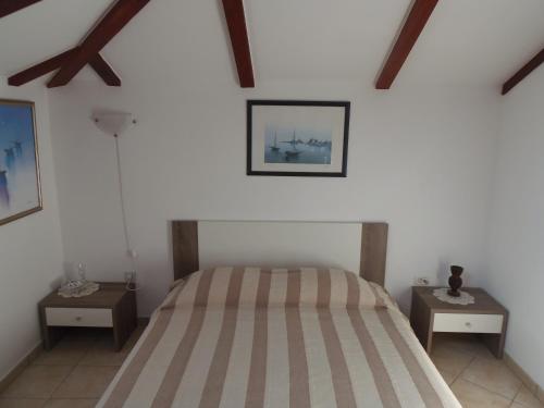 Ένα ή περισσότερα κρεβάτια σε δωμάτιο στο Apartment Noemi