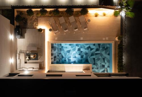 a large aquarium in a room with lights at Villa Perla Vir in Vir
