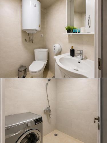 a bathroom with a toilet sink and a washing machine at Mestia Central Apartment in Mestia