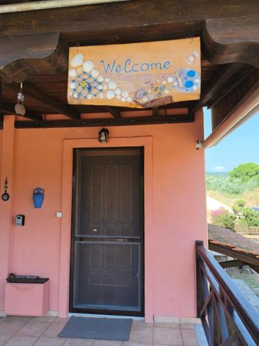 a building with a sign that says we gonna at Villa near Ierissos in Ierissos
