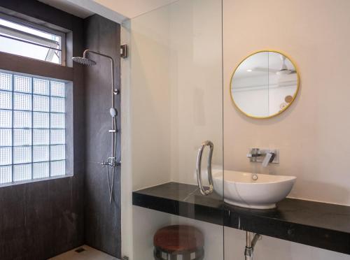 a bathroom with a sink and a mirror at Baan Iris 2Br Private Pool & Sunrise Deck in Chaweng