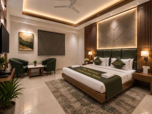 a bedroom with a large bed in a room at The Runway Corporate Hotel IGI Delhi Airport Terminal-3 With Free Airport Pickup in New Delhi