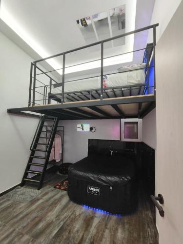a room with a bunk bed and a ladder at Magic House in Palermo