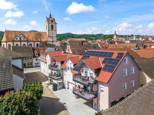 an aerial view of a town with solar panels on roofs at Apartment Laura - S7 by Interhome in Endingen
