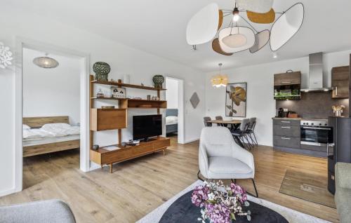 a large living room with a kitchen and a living room at Ferienfreude in Winterberg