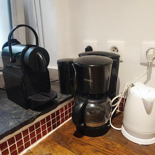 a coffee maker sitting on top of a counter at Little studio in the old town in Vence
