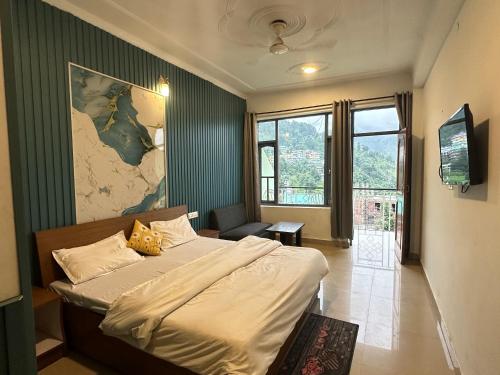 a bedroom with a bed with a map on the wall at Hotel Backpacers Mcleodganj in McLeod Ganj