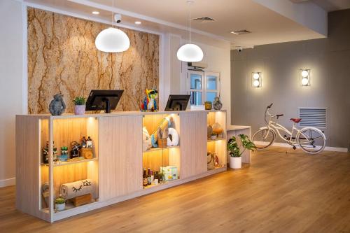 a room with a counter with a bike on it at INNSiDE by Meliá Costablanca in Benidorm