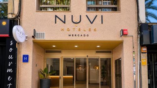 a nw hotel sign on the side of a building at Nuvi Mercado in Alicante