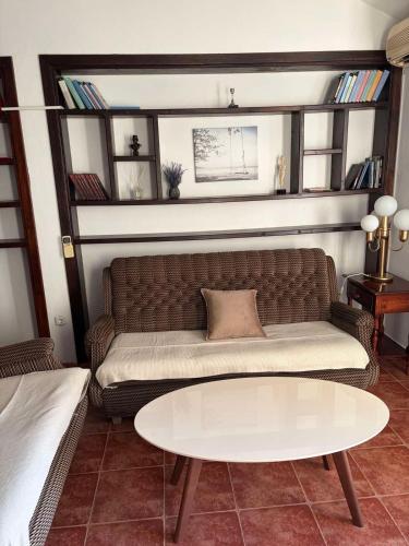 a living room with a couch and a table at Lavanda in Budva