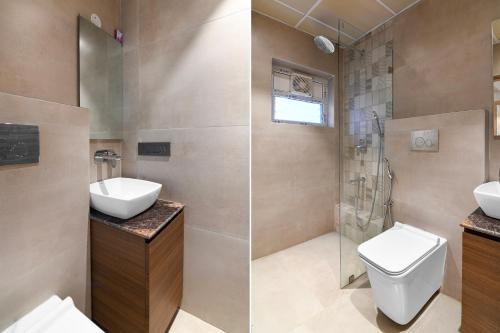 a bathroom with a toilet and a sink and a shower at Morya Villa - A Boutique Hotel in kolkata