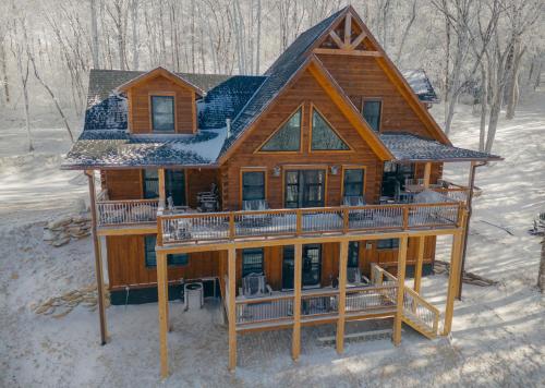 an overhead view of a log cabin in the snow at Shawnee Ridge Lodge in Banner Elk
