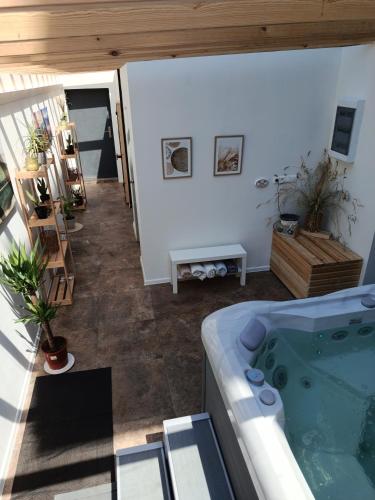 a bathroom with a bath tub in a room at Poza Horyzont in Korbielów