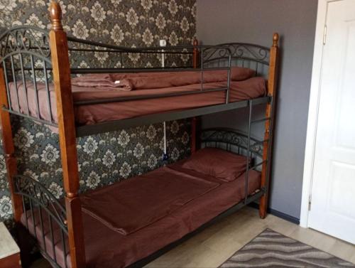 a couple of bunk beds in a room at Hostel COMFORT in Mukacheve