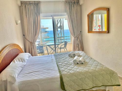 Apartamento en primera linea playa Arenal con 2 dormitorios