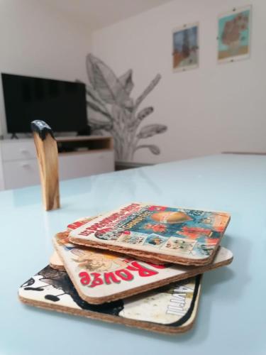 a tray with a coke sign on top of a table at Apartmán Nádvorie in Levoča