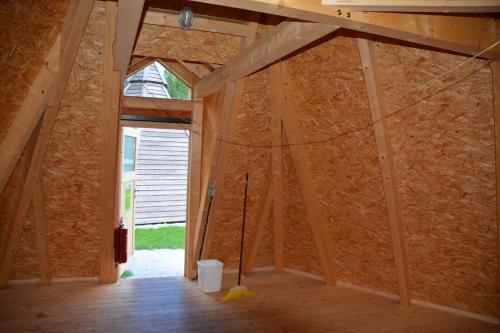 a room under construction with a wall being constructed at Tipi Dorf Gröbming in Gröbming