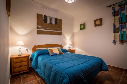 Ένα ή περισσότερα κρεβάτια σε δωμάτιο στο Casa Rural Espinarural
