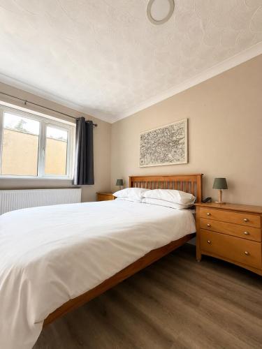 a bedroom with a large bed and a window at The Bay Horse Accommodation Contractor Rooms in Carlton