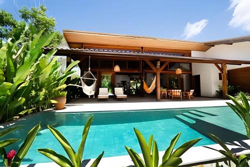 an image of a villa with a swimming pool at Casas Versos do Mar in Marau