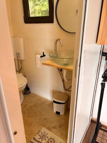 a bathroom with a sink and a toilet at Ecoclub in Varna City