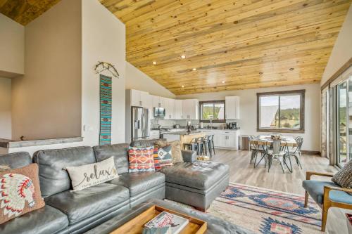 a living room with a couch and a table at 128 Capitan Circle ("Basecamp") in Pagosa Springs