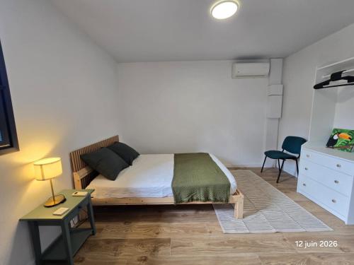 Llit o llits en una habitació de Athéna