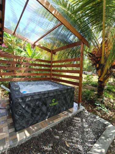 acoveredificialificialificialificialificialificialificialificialificialificialificialificialificialificial at Gites kaz à klemence - Bungalow karapat - jacuzzi privé et piscine partagée au cœur de la nature à Anse-Bertrand in Anse-Bertrand
