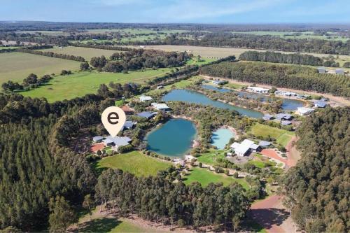 an aerial view of a large estate with two lakes at Bonnie - Lakeside Relaxation surrounded by Wineries in Wilyabrup