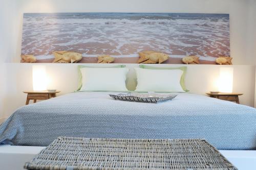 מיטה או מיטות בחדר ב-Lidia Villa