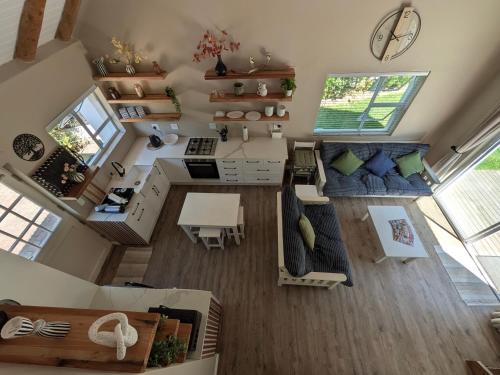 an overhead view of a living room and kitchen at Cape St Francis Beach Cottage in Cape St Francis