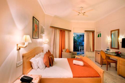 En eller flere senge i et værelse på Avion Holiday Resort