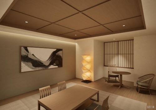 a living room with a table and chairs and a dining room at Shinzan Kinosaki in Toyooka
