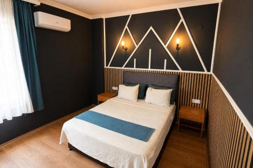 Llit o llits en una habitació de Elite Hotel City Center Corlu Bed and Breakfast