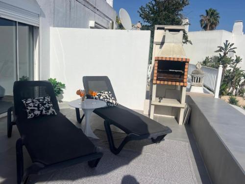 Seascape apartamento vista mar e piscina, terraço com BBQ