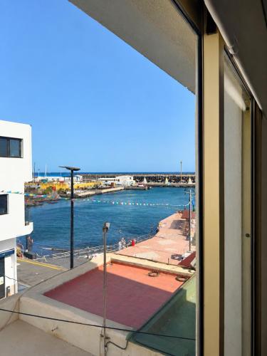 a view of a body of water from a building at El HierroStay Appartments - La Chalana & El Remo in La Restinga