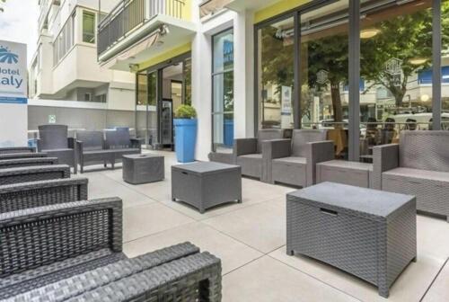 a row of benches in a shopping mall at Hotel ITALY in Misano Adriatico