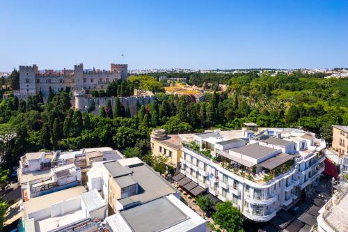 an aerial view of a city with a castle at The 12th City Hotel in Rhodes Town
