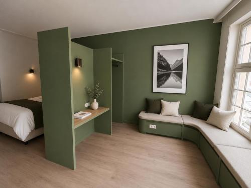 Llit o llits en una habitació de Hotel Lucca