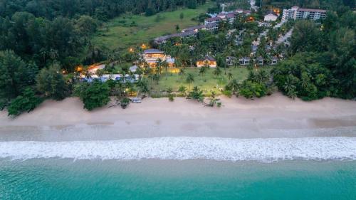 an aerial view of a resort on a beach at Kantary Beach Hotel Villas & Suites in Khao Lak