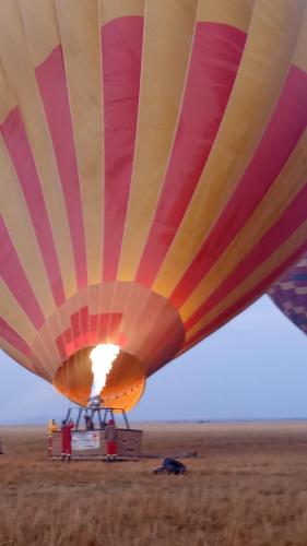 a colorful hot air balloon in the desert at Empiris homestay in Sekenani