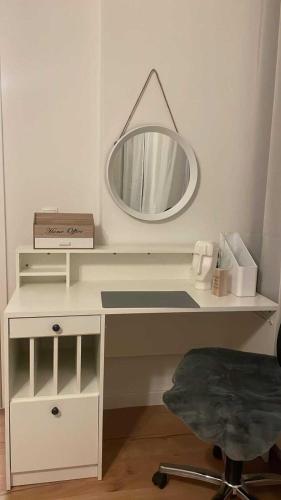 a white desk with a mirror on top of it at Museums Quartier 0608 in Vienna