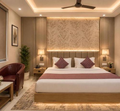 a bedroom with a large bed and a couch at Hotel Airport Hilton Sky IGI Delhi Airport Terminal 3 With- Free Airport Pickup in New Delhi