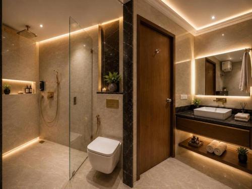 a bathroom with a toilet and a shower and a sink at Hotel Airport Hilton Sky IGI Delhi Airport Terminal 3 With- Free Airport Pickup in New Delhi