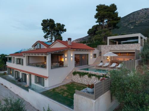 an aerial view of a house at Villa Carina by TwentyTwo in Ancient Epidauros