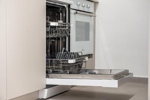 a shopping cart in a dishwasher in a kitchen at  