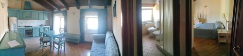 two views of a kitchen and a living room at Agriturismo Hermada in Duino