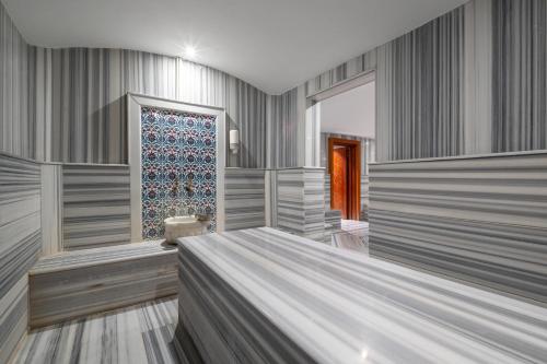 a room with a bed and a window at Park Inn by Radisson Istanbul Asia Kavacik in Istanbul
