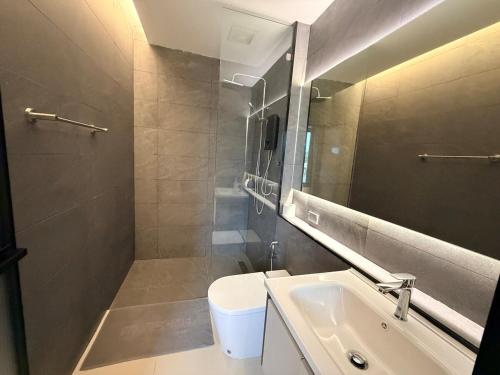 a bathroom with a sink and a mirror at LaViena pool villa in Vientiane