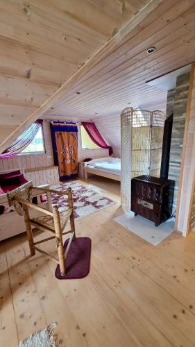 a room with a bed and a desk in a cabin at Countryhome apartment in Jõõpre